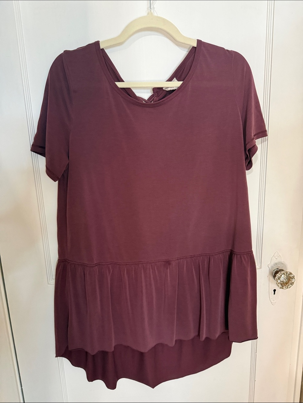 Short-Sleeve Peplum Tunic in Plum